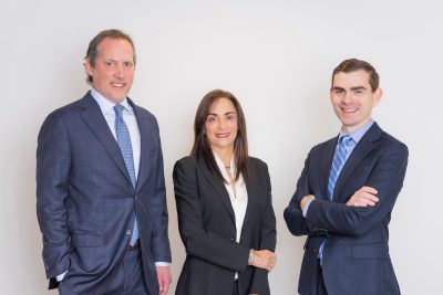 Group photo of three Stern Edlin Graham attorneys standing together