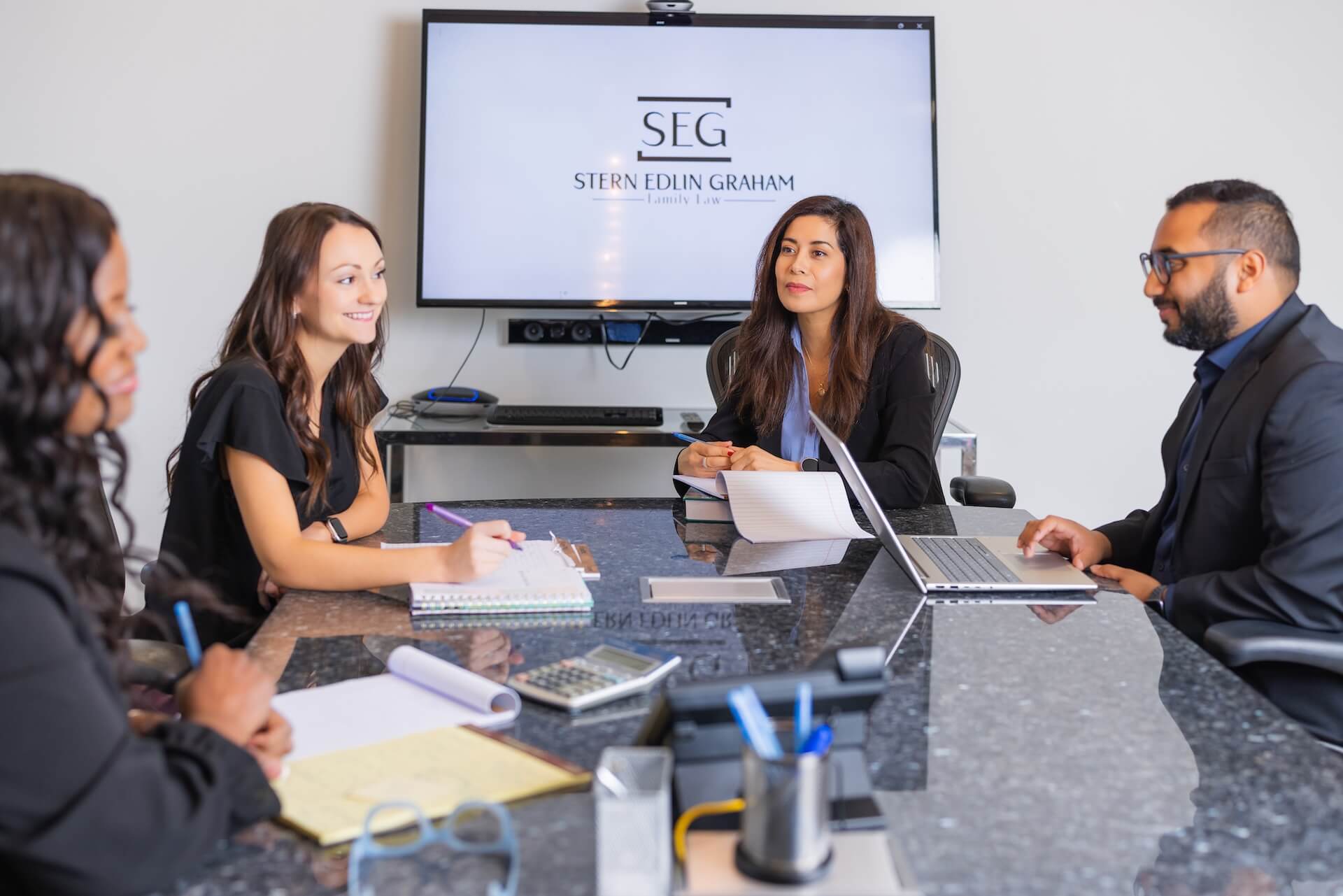 Stern Edlin Graham team meeting in the conference room