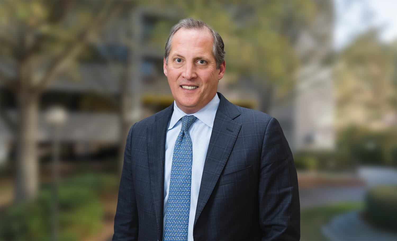 Portrait of Gary Graham, attorney at Stern Edlin Graham, standing outdoors