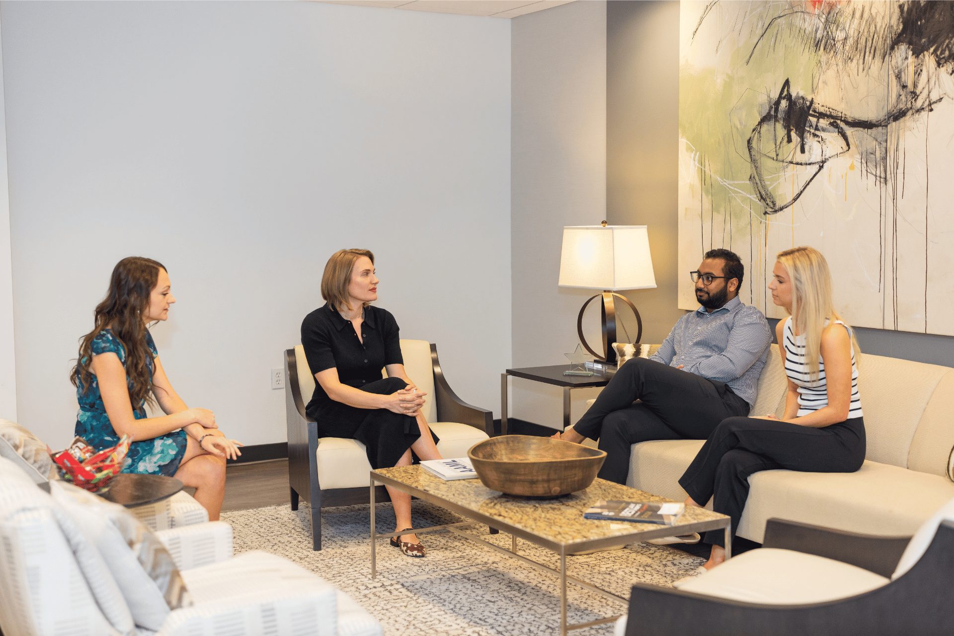 Stern Edlin Graham team members meeting in the office lounge